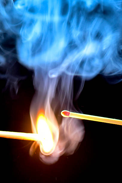 istock Igniting match about to ignite another red match 468442442