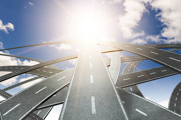 A highway going into the heavens or the sky with lens flare and multiple roads going in wrong direction.  Please see my portfolio for other concept images. 