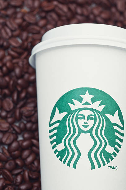 starbucks coffee cup - starbucks coffee bean editorial stock-fotos und bilder