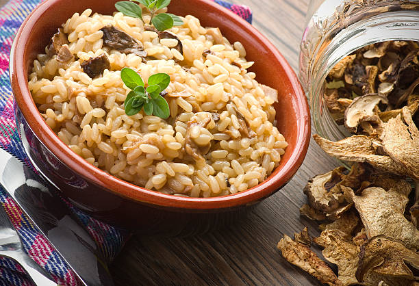 istock Rice and dried porcini mushrooms 468444463