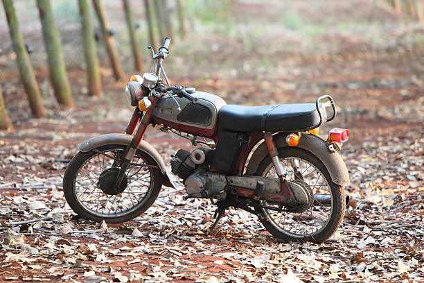 istock the old rusty motorcycle in garden 468444751