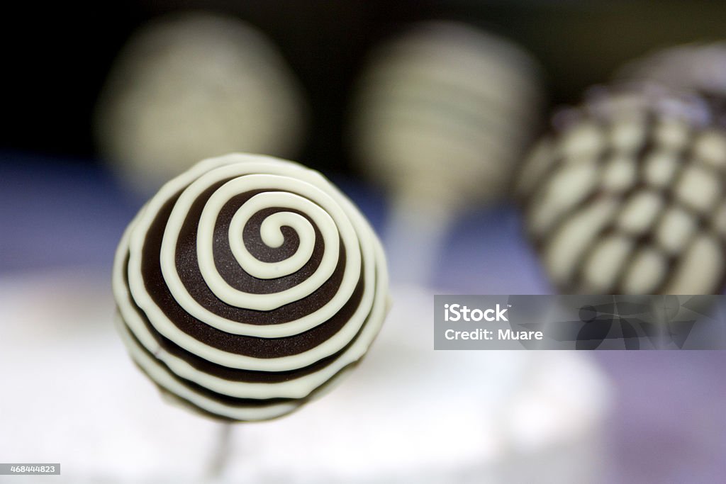 Cakepops Dark chocolate cakepops decorated with white chocolate Cake Pop Stock Photo
