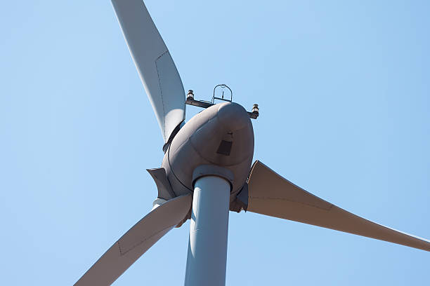 istock Wind electric generator against blue sky background 468446689