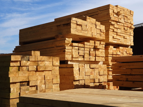 Image of lumber / timber yard, stacks of pine-wood planks / boards