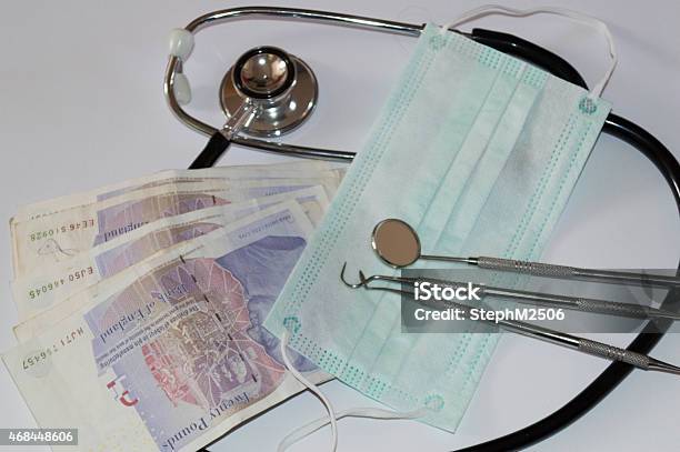 Money And Healthcare Stock Photo - Download Image Now - 2015, Blue, British Currency