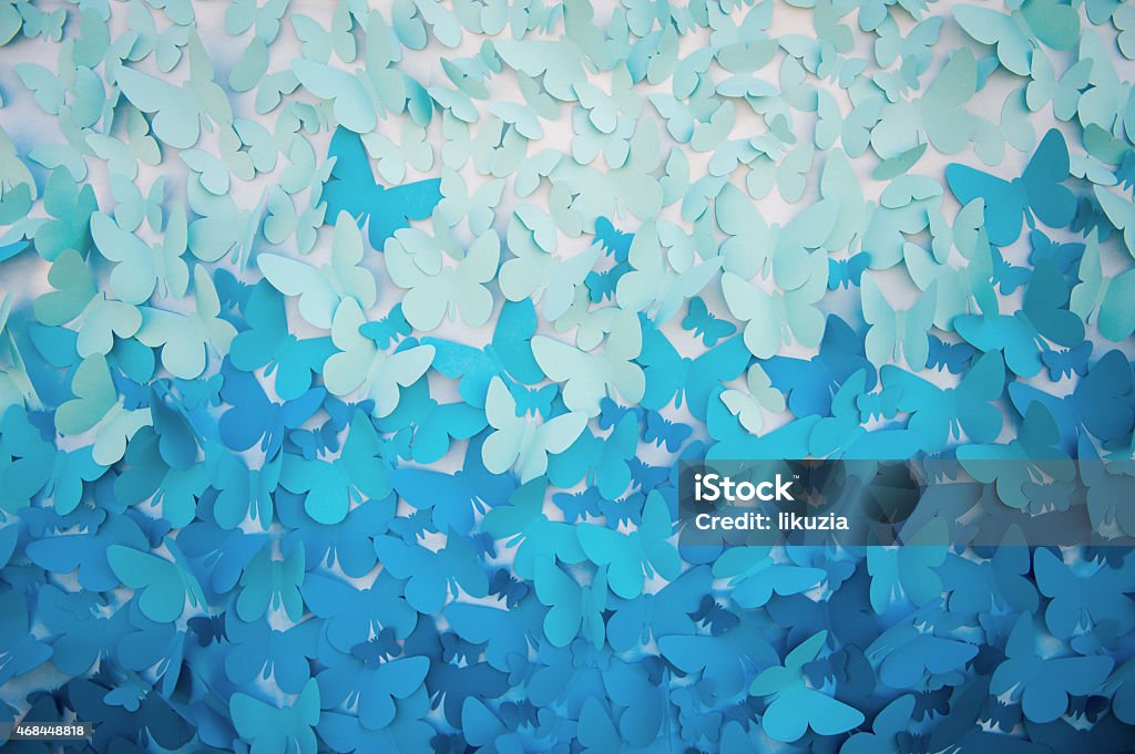 background of blue butterflies background of blue butterflies made of paper Butterfly - Insect Stock Photo