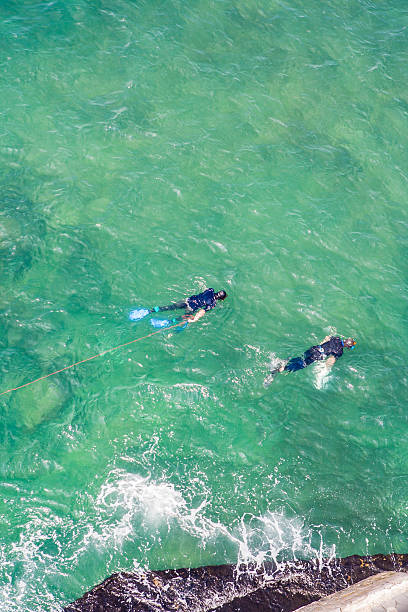 istock Couple snorkeling 468449220