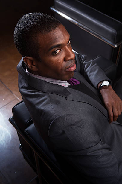 istock Annoyed Looking Young Professional Relaxing on Sofa 468449772