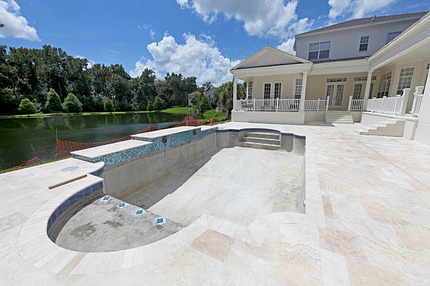 Pool Construction A Swimming Pool under construction in Florida travertine pool photos stock pictures, royalty-free photos & images