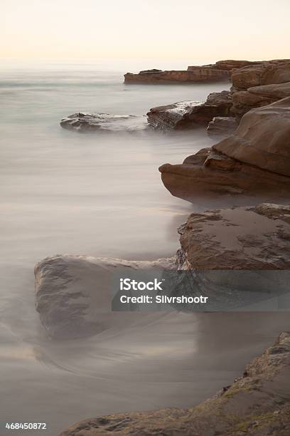 Rocky Outcrop Along The Pacific Ocean Stock Photo - Download Image Now - 2015, Beach, Blurred Motion