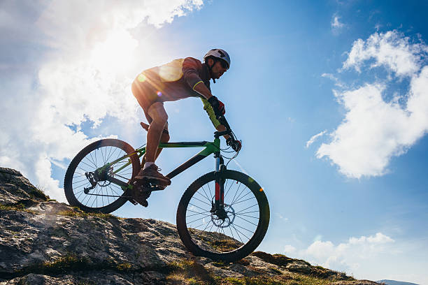 istock Adventurous Man riding his bike on steep terrain 468450962