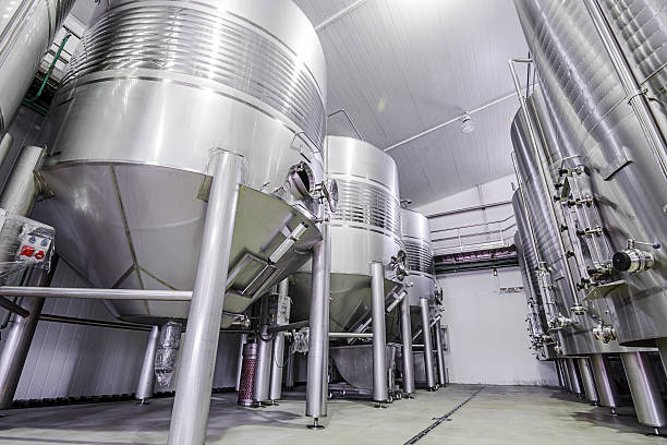 istock Large stainless steel wine tanks in a modern winery 468454114
