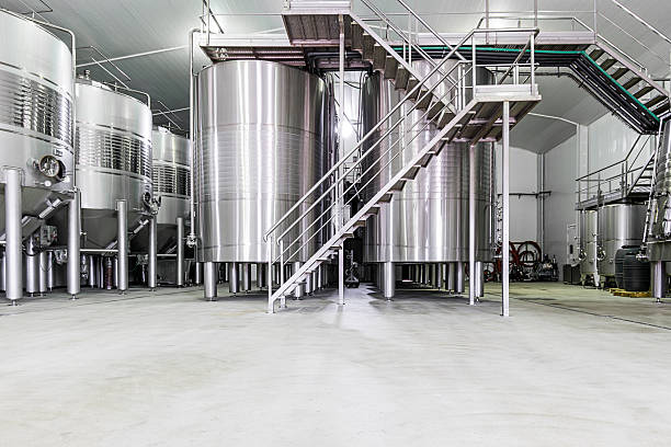 Industrial stainless steel wine cellar vats modern wine cellar with stainless steel tanks vat stock pictures, royalty-free photos & images