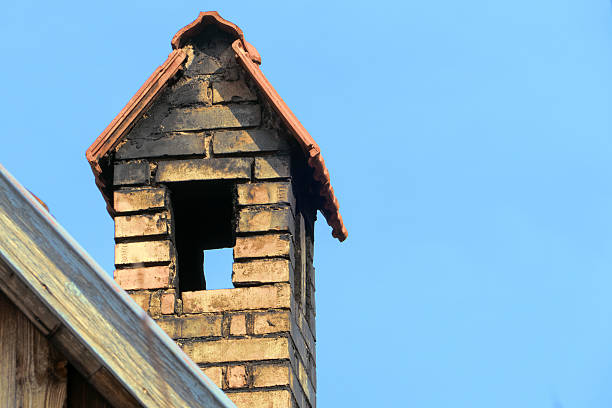 istock chimney with roof against blue sky, copy space 468456846