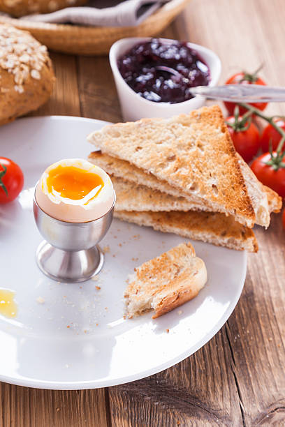 istock Soft-boiled egg in the morning with toast 468458118