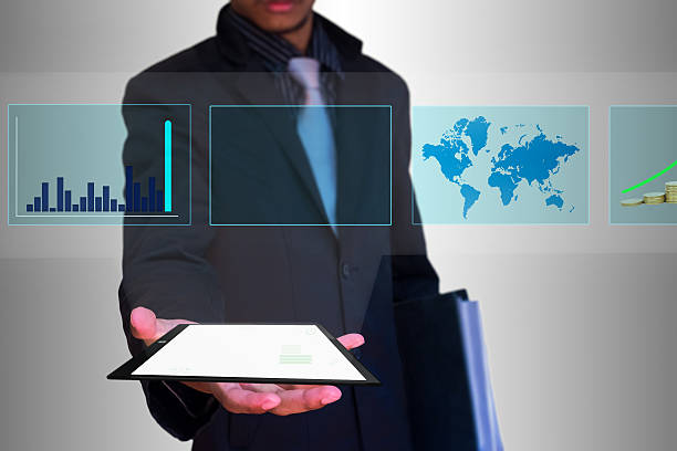 istock slide show tablet in hand businessman 468460159