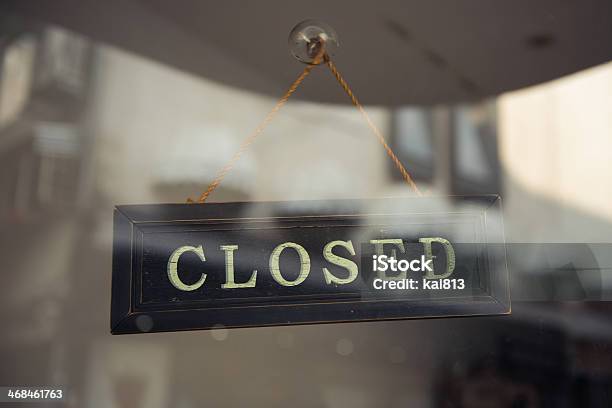 Hanging Closed Sign Behind Glass Stock Photo - Download Image Now - Going Out Of Business, Business, Closing
