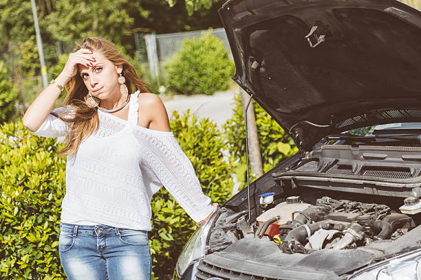 istock Young Woman with Damaged Car 468462001