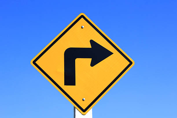 istock yellow right turn road sign 468462291