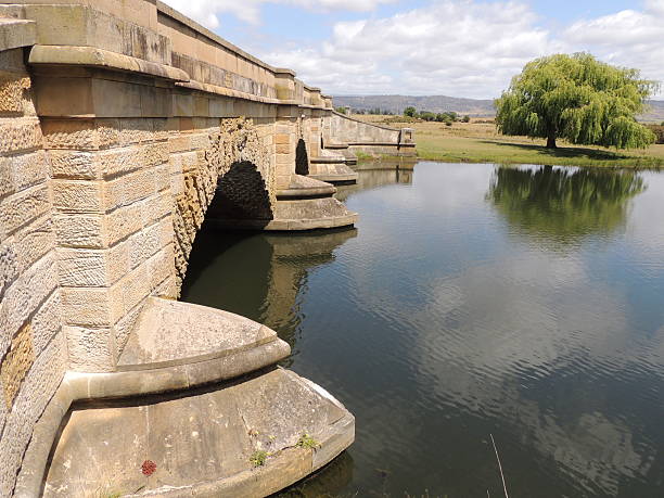 A carved sandstone bridge built by convict labor. Popular spot for tourists to stop and feed the ducks on the Macquarie River Tasmania, Australia.