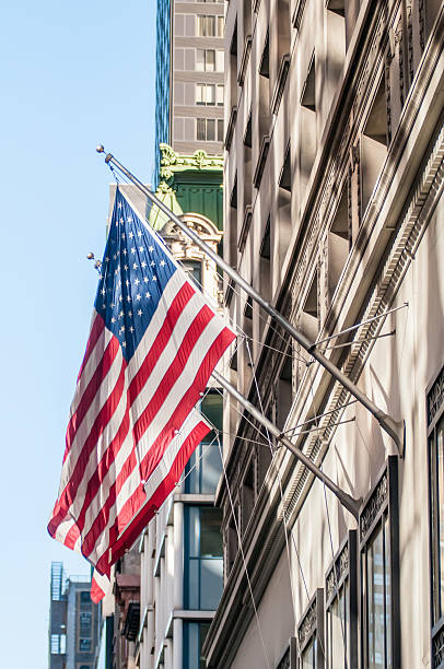 istock american flag on a historic building 468466830