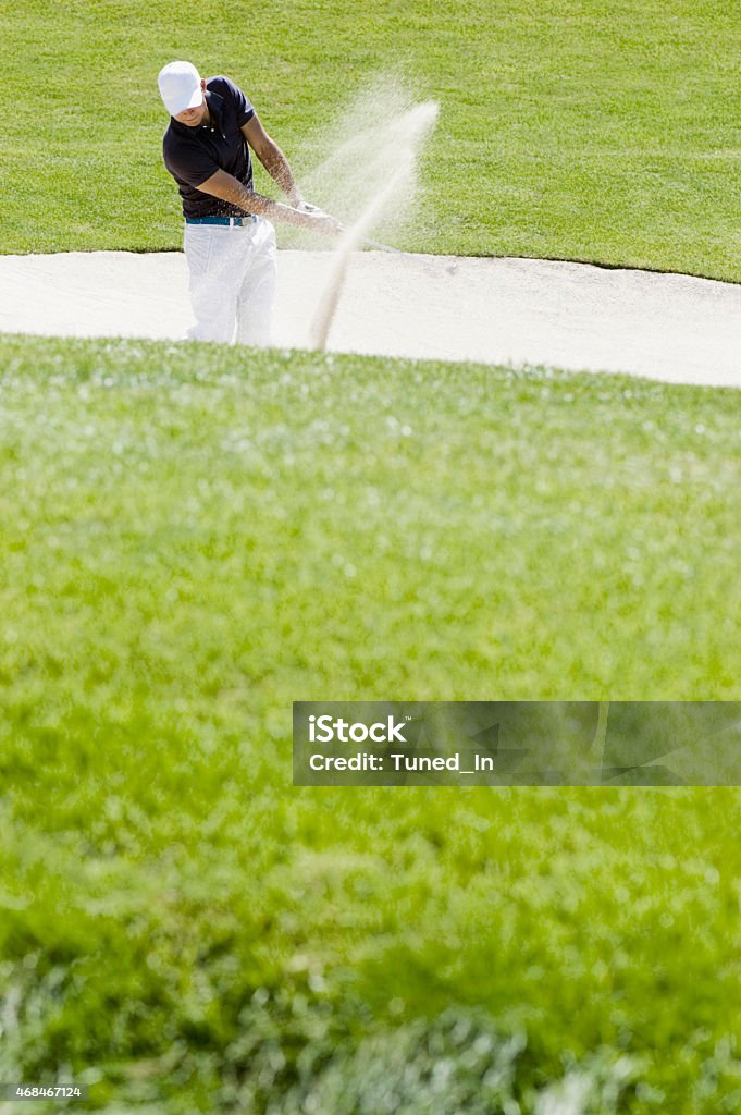 Golf player playing bunker shots Golf Stock Photo