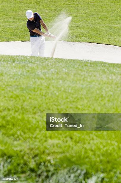 Golf Player Playing Bunker Shots Stock Photo - Download Image Now - Golf, Sand Trap, Taking a Shot - Sport