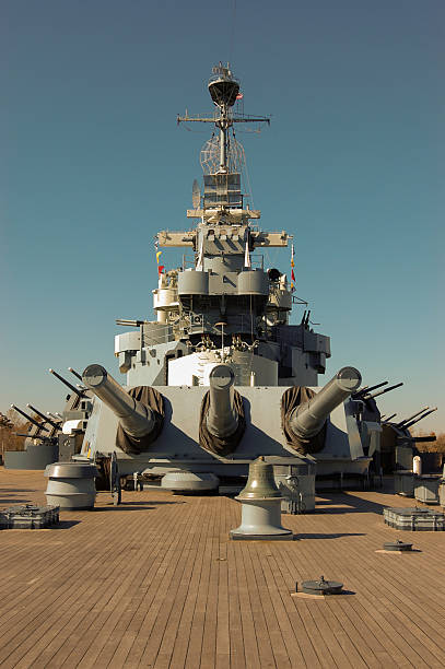 USS North Carolina The USS North Carolina, moored on the Cape Fear River in Wilmington, NC wilmington north carolina stock pictures, royalty-free photos & images