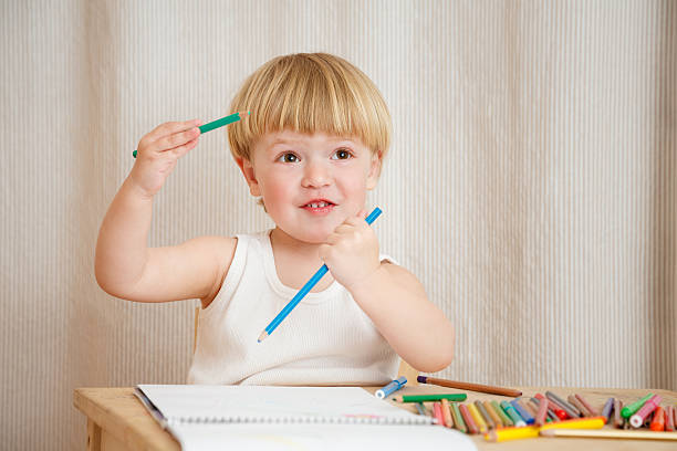 istock little girl drawing 468472799