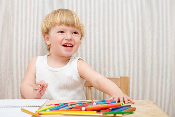 istock little girl drawing 468472813