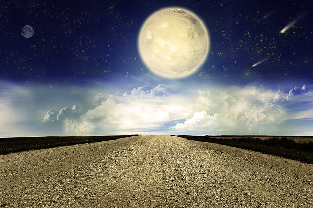 istock Starry sky and country road 468472856
