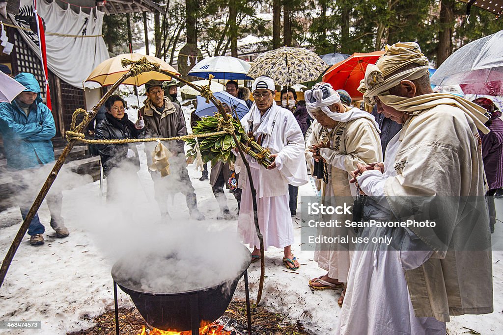 Shinto Ceremony Nagano, Japan - February 4, 2013: Shinto Ascetics perform ancient purifying rites. Known as Yamabushi, they are mountain hermits with a long tradition of mysticism. Japan Stock Photo