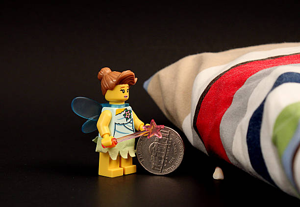 Colorado, USA - March 29, 2015: Studio shot of Lego tooth fairy. Legos are a popular line of plastic construction toys manufactured by The Lego Group, a company based in Denmark.