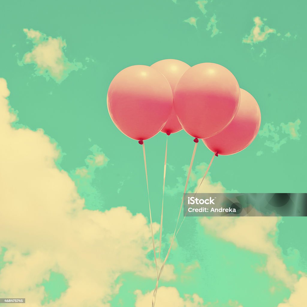 Four Pink Balloons Four pink balloons over mint sky Balloon Stock Photo