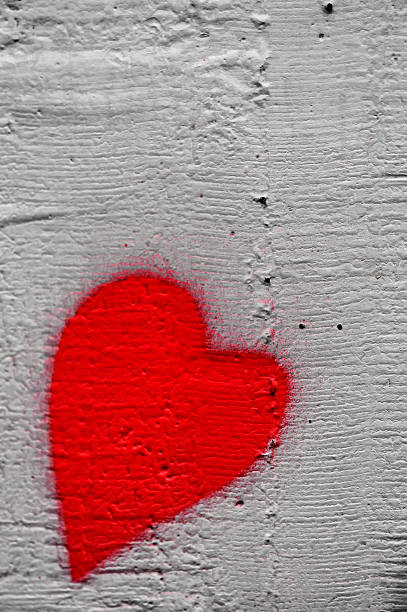 istock red heart on the concrete wall 468476605