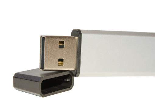 Close up USB flash memory or disk-on-key with isolate on white