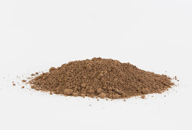 istock White background with a pile of soil in the middle 468478834
