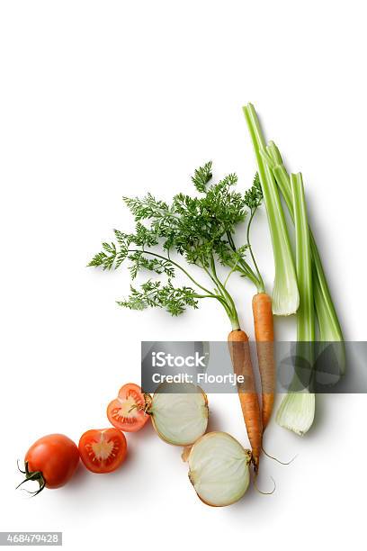 Vegetables Carrot Celery Onion And Tomato Isolated On White Background Stock Photo - Download Image Now