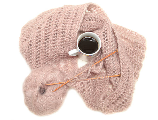 istock Handmade knit scarf with cup of coffee 468482884