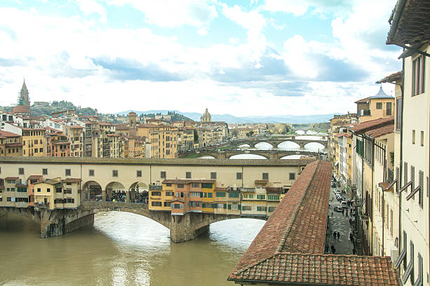 istock Arno River and city in Florence, Italy, with Ponte Vecchio 468486724