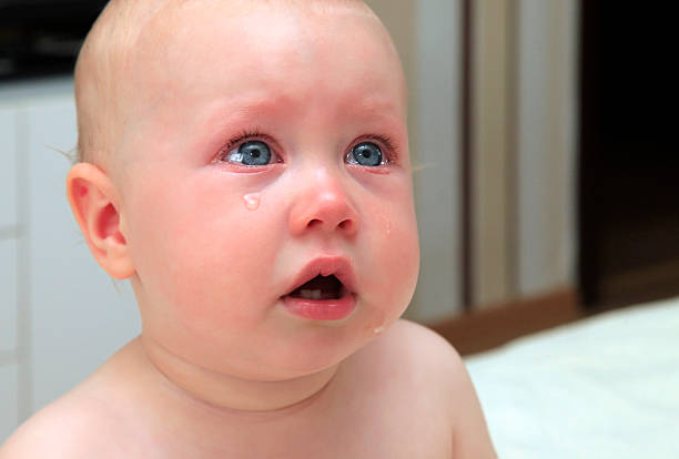 istock sad little girl 468487888