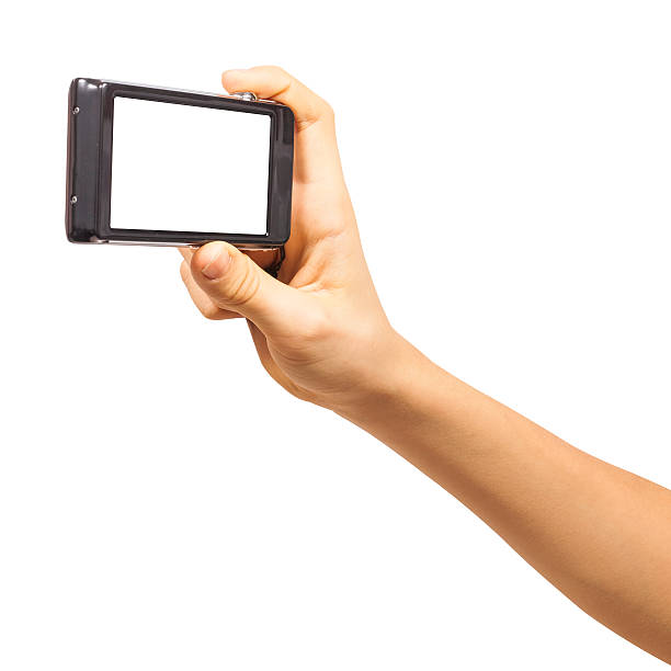 istock Compact photo camera in hand isolated on white background 468487892