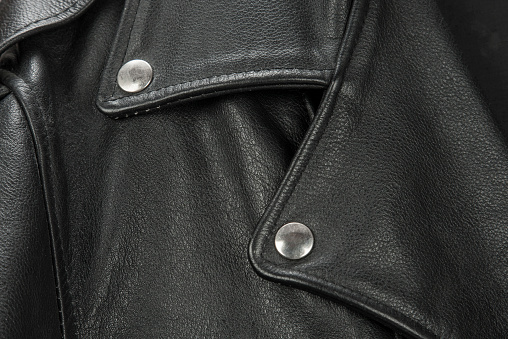 close-up of black leather jacket details