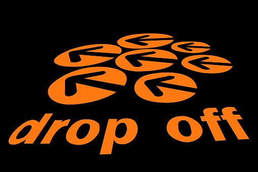 Drop off sign isolated on black background