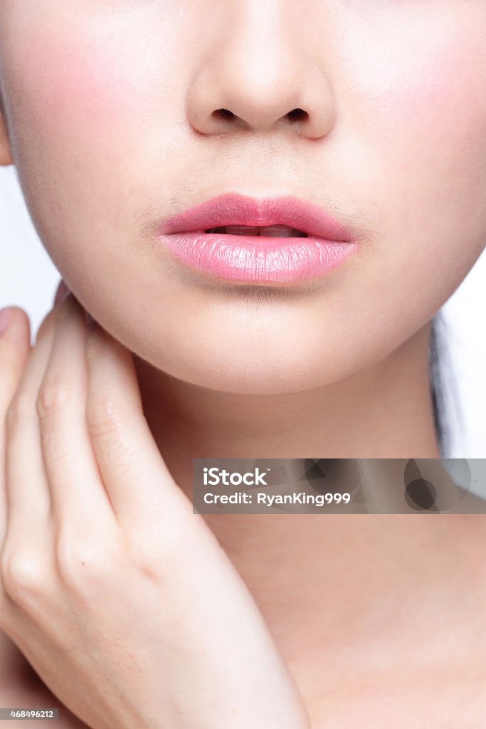 A young woman with beautiful lips Close up portrait of young woman with beautiful lips 2015 Stock Photo