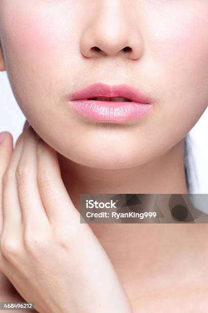 A Young Woman With Beautiful Lips Stock Photo - Download Image Now - 2015, Adult, Asia