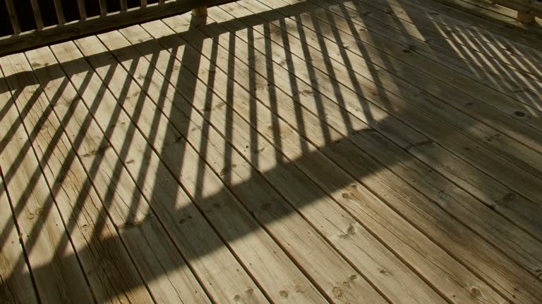 Time Lapse Shadows Moving Across Wooden Deck in Back Yard.