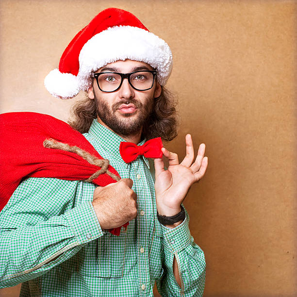 istock Santa Claus looking into the camera with traditional background 468500123