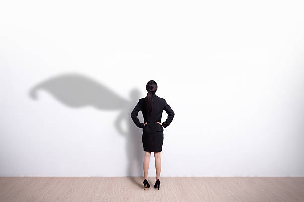 istock Superhero business woman looking 468502834