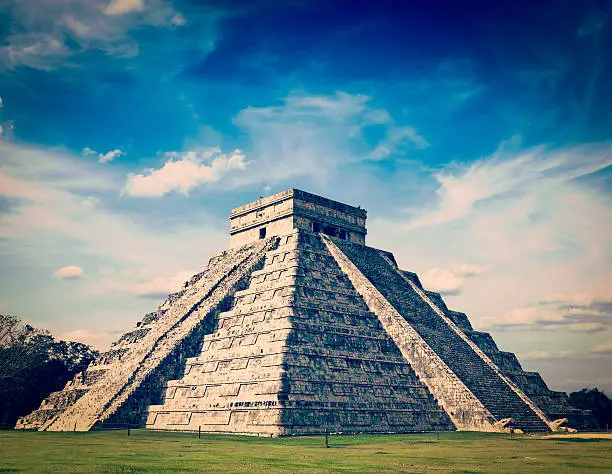Vintage retro effect filtered hipster style image of Mexico travel background famous mexican landmark - anicent Maya mayan pyramid El Castillo Kukulkan in Chichen-Itza, Mexico